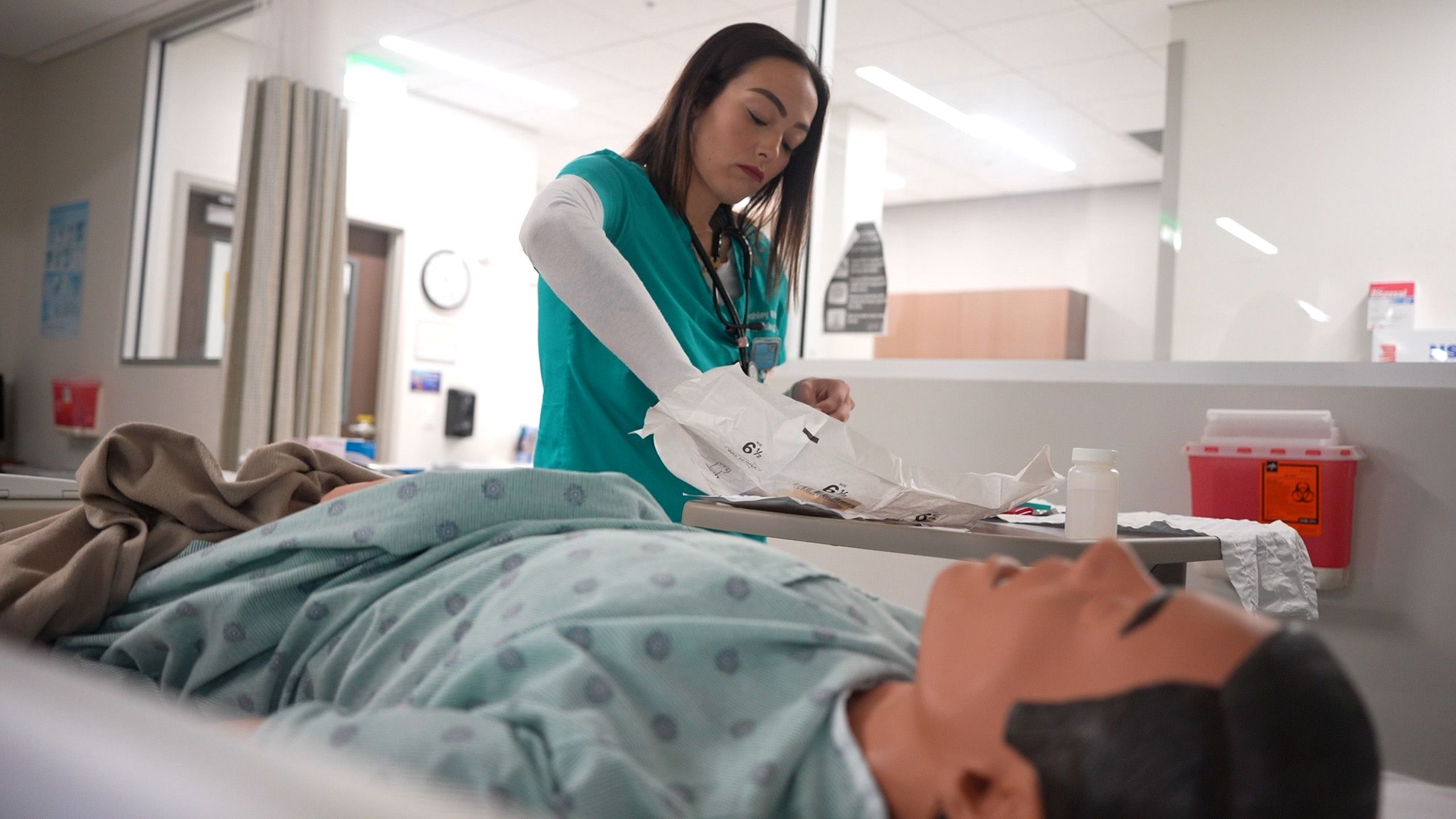 student Ashley Rivera working in a lab simulation